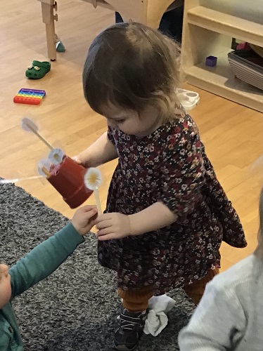 child holding object