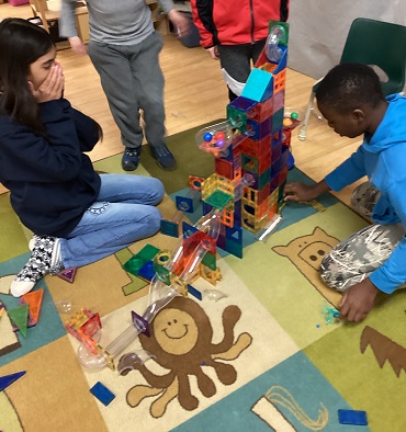 2 school age children in a big race