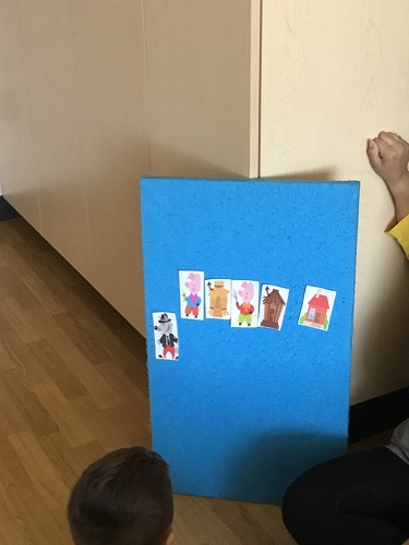 A felt board with the pieces of the story attached