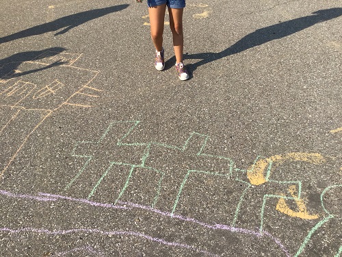 Chalk drawings on the pavement outside