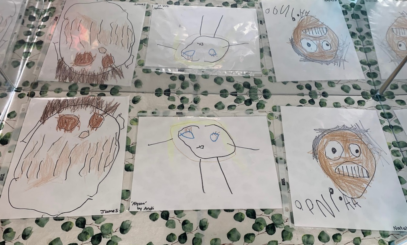 A collection of self-portraits created by the preschoolers.