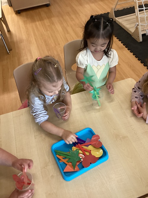 Preschool children looking at various shapes