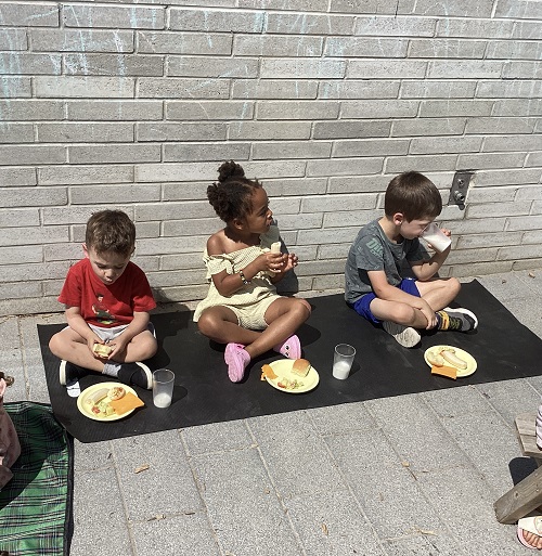 Preschool children having a picnic