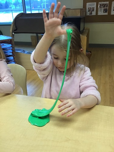 Children exploring with new classroom toys