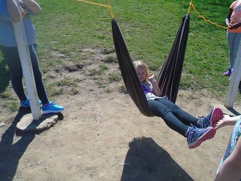 school-age child in a hammock