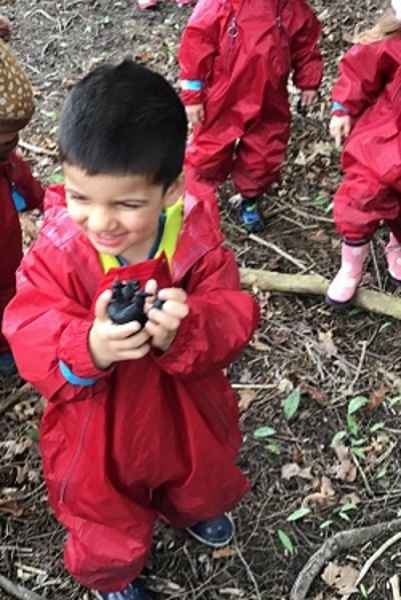 happy boy enjoying a nature walk