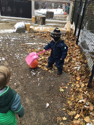child playing with object