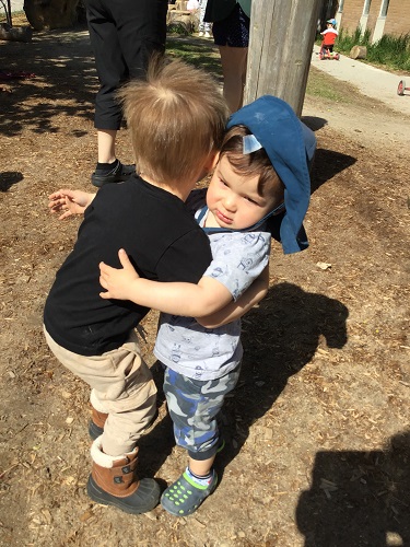 Two Toddlers hugging