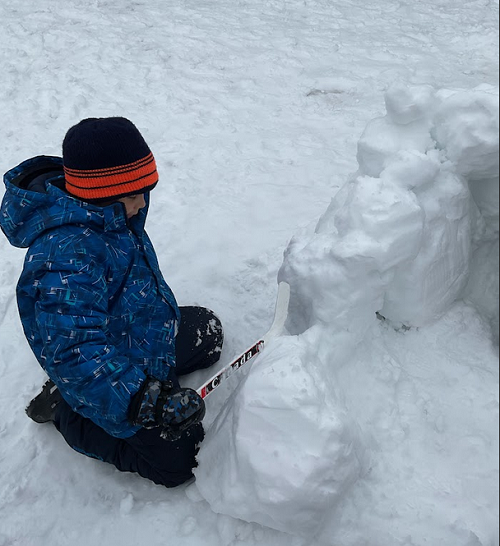 child building a fort