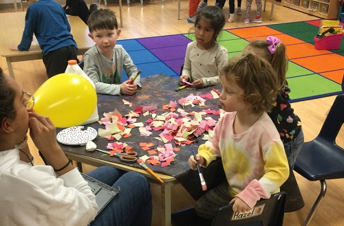 A group of children getting ready to create a pinata