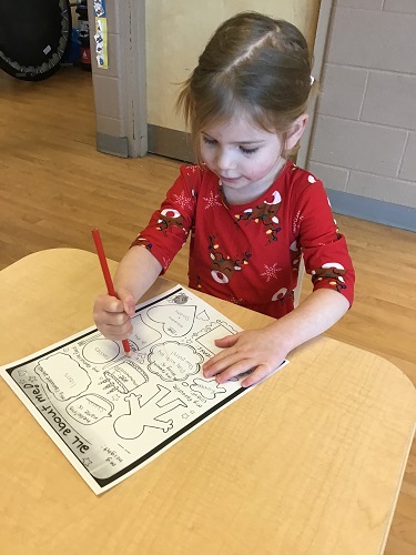 Child drawing on paper