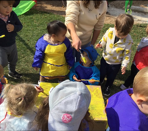 Painting a cardboard box yellow